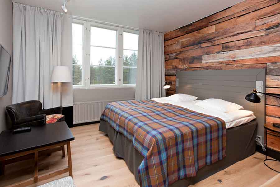 Superior kamer in hotel Holiday Club Kuusamon Tripiikki met BBI Travel